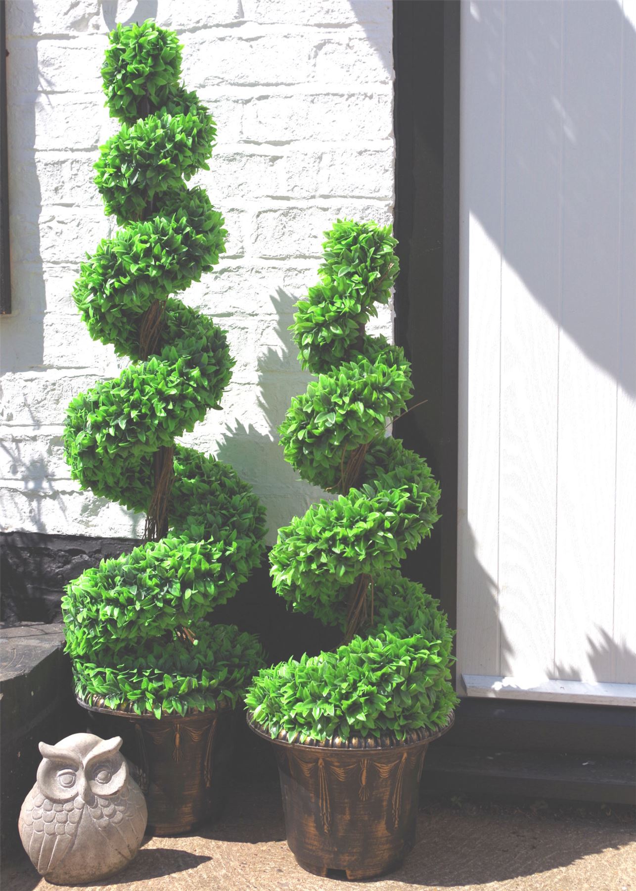 120cm Pair of Green Large Leaf Spiral Topiary Trees with Decorative Planters - Image 5